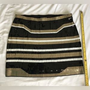 Gorgeous EUC Express full sequins black/gold/white stretchy miniskirt.